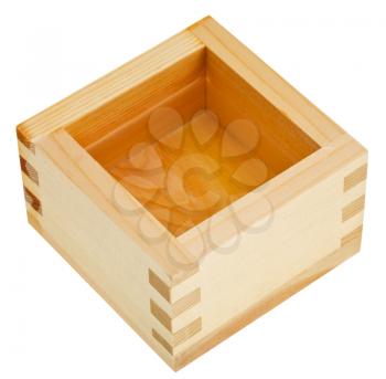 japanese wooden box masu with sake isolated on white background