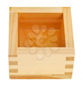traditional wooden box masu with sake isolated on white background
