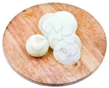 onion bulb and sliced onions on wooden cutting board isolated on white background