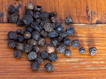 macro view of black pepper peppercorns