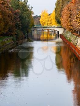bridge and leaves fall on Landwehrkanal in Berlin in autumn day