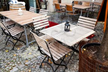empty outdoor restaurant tables on kurfurstendamm in Berlin in autumn