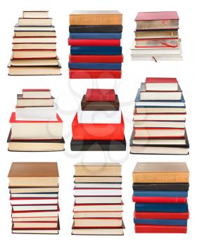 set from piles of different sizes books isolated on white background