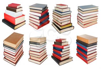 set from different angles stacks of books isolated on white background