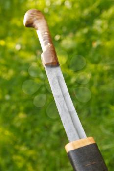 cossack saber unsheathing from wooden sheath