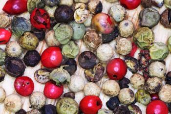 top view of different peppercorns close up