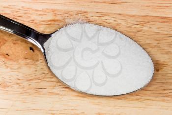 spoon of finely ground sea salt close up
