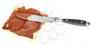 sweet sandwich from fresh toast with chocolate spread, table knife isolated on white background