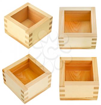 set of traditional wooden box for sake - masu isolated on white background