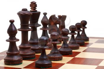 black chess pieces placed on chessboard close up