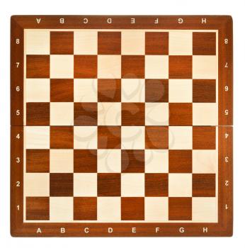 top view of wooden chessboard isolated on white background