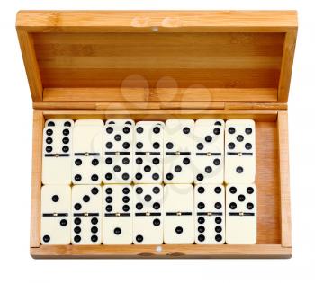 set of dominoes in bamboo box isolated on white background