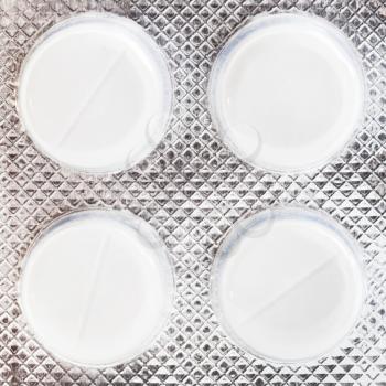 pack of white tablets close up