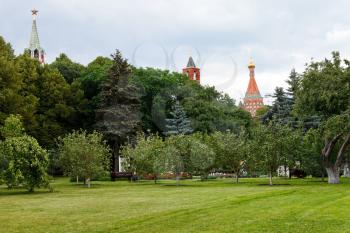 lawn of Taynitsky Garden and towers of Moscow Kremlin