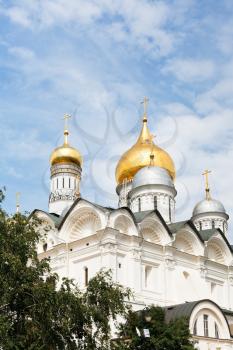 view of cupolas Cathedral of the Archangel and Bell Tower in Moscow Kremlin