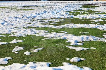 snow on outdoor soccer field in low season