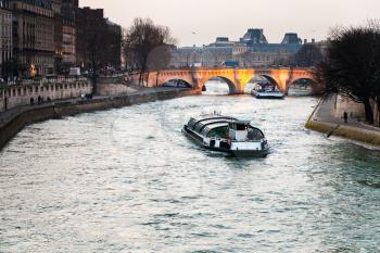 gloaming panorama of Seine river and Pont Neuf in Paris