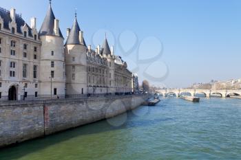 Conciergerie palace and Pont Neuf in Paris on Quai de l Horloge