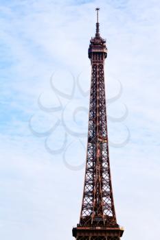Eiffel tower with blue sky and white clouds in Paris