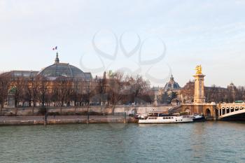 Pont Alexandre III and Grand Palais in Paris evening