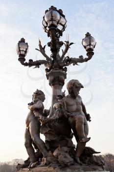 art nouveau urban lantern of Pont Alexandre iii in Paris