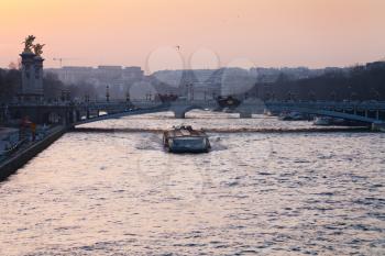 view of pont alexandre iii in Paris on sunset