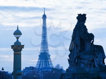 statue Marseille, column on place de la Concorde and Eiffel Tower in Paris at sunset