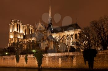cathedral Notre Dame de Paris and Seine River at night