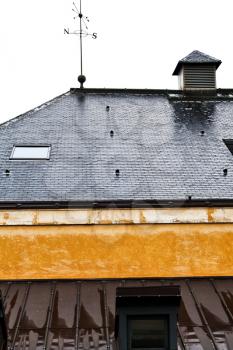wet roof of Paris house in rainy overcast day
