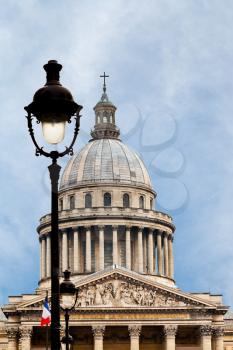 urban lamp and Pantheon on background in Paris