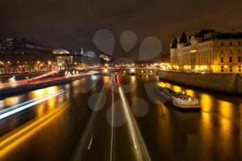 Panorama of Seine with Pont au Change in Paris at night