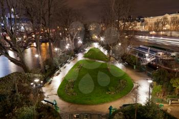 Square du Vert-Galant on Ile de la Cite in Paris at night