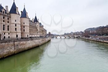 panorama with conciergerie palace and pont neuf in paris