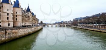 Panorama of Seine river with conciergerie palace and pont neuf in paris in March