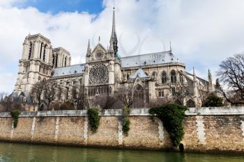 cathedral Notre Dame de Paris and Seine River in cloudy day