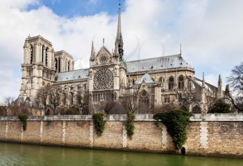 cathedral Notre-Dame de Paris and Seine River in cloudy day