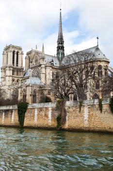 Notre-Dame de Paris and Seine River in cloudy day