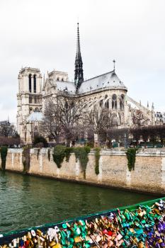 Pont de l Archeveche with love padlocks and cathedral Notre-Dame de Paris