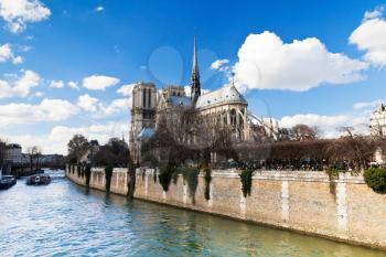panorama with cathedral Notre Dame de Paris and Seine River in spring