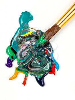 round paintbrush mix multicolored watercolor paints close up