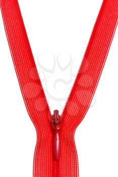 plastic red coil zip fastener close up isolated on white background