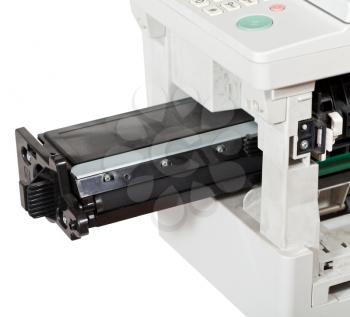 inserting of toner cartridge in office multifunctional device close up