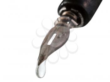 transparent poison drop dripping from the tip of pen close up