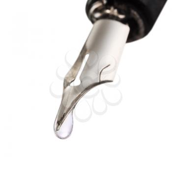 transparent liquid drop dripping from the nib of pen close up