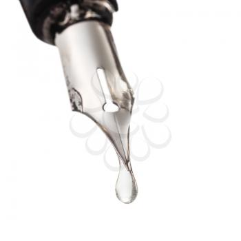 transparent water drop dripping from the nib of pen close up