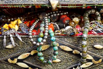 antique jewelry in ancient treasure chest close up