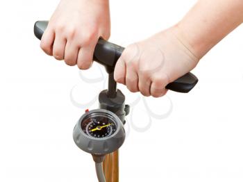 pumping by manual air pump with pressure indicator isolated on white background
