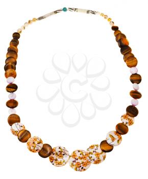 necklace from natural mineral beads of decorated mother-of-pearl, tigers eye stones, carved bone isolated on white background