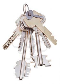 big bunch of door keys isolated on white background