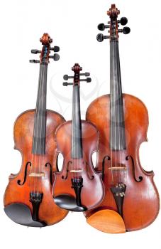 three sizes of fiddles isolated on white background close up